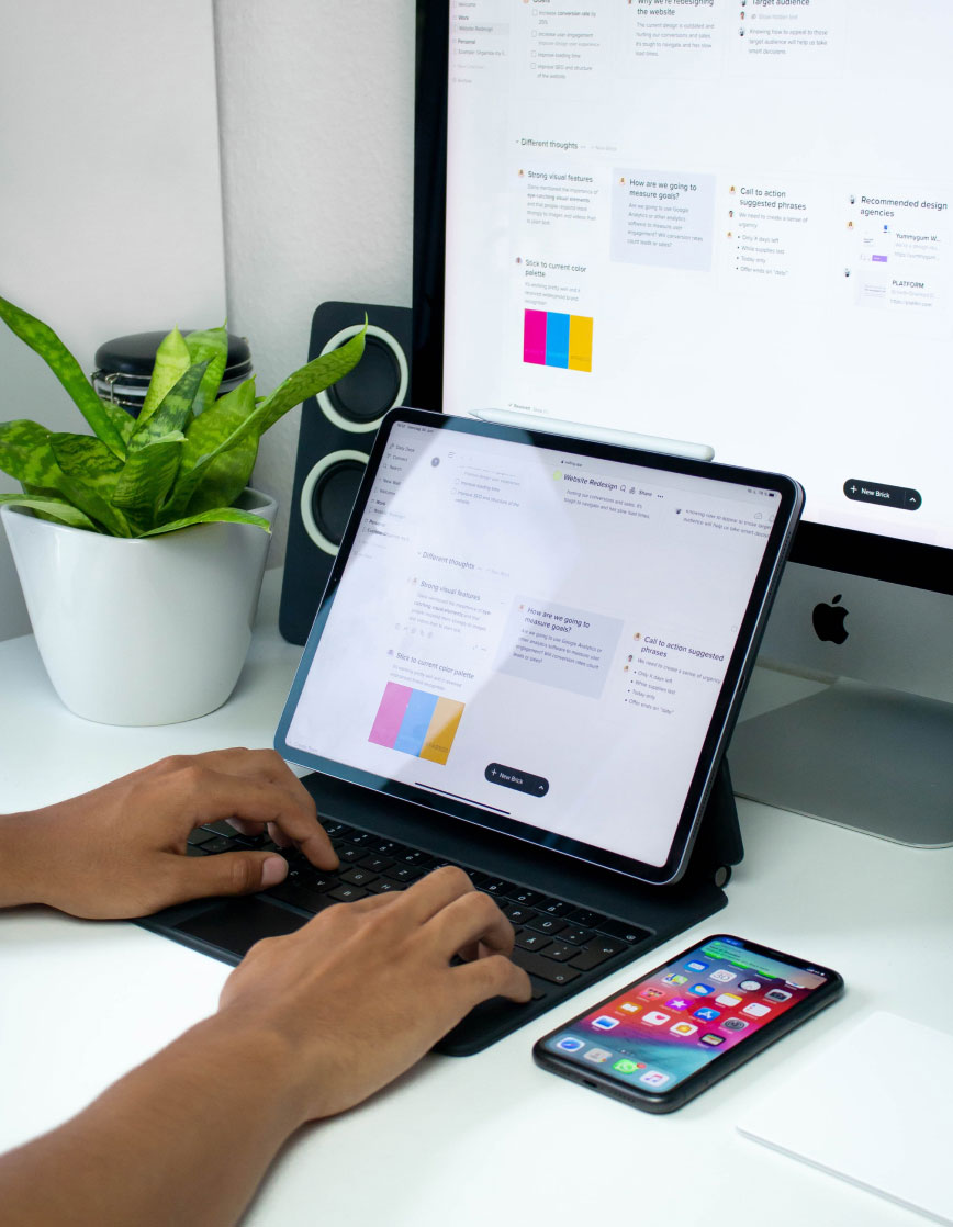 Person Working on Tablet Person Working on Tablet